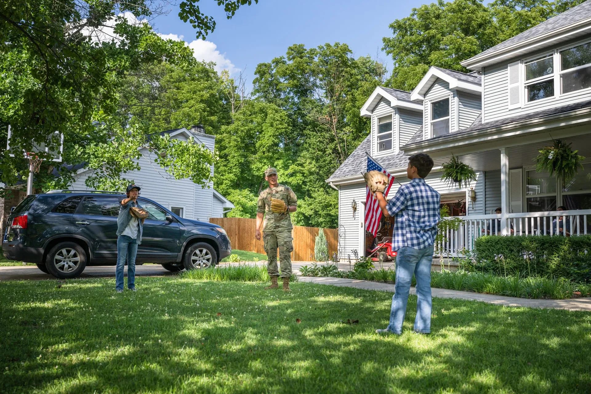 Family playing baseball