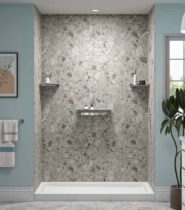 BathWraps&reg; Lifestyle collection Terrazzo textured walls with an Alabaster White shower base and chrome shelves